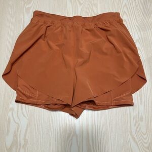 Athleta Orange Athletic Shorts Relaxed Fit